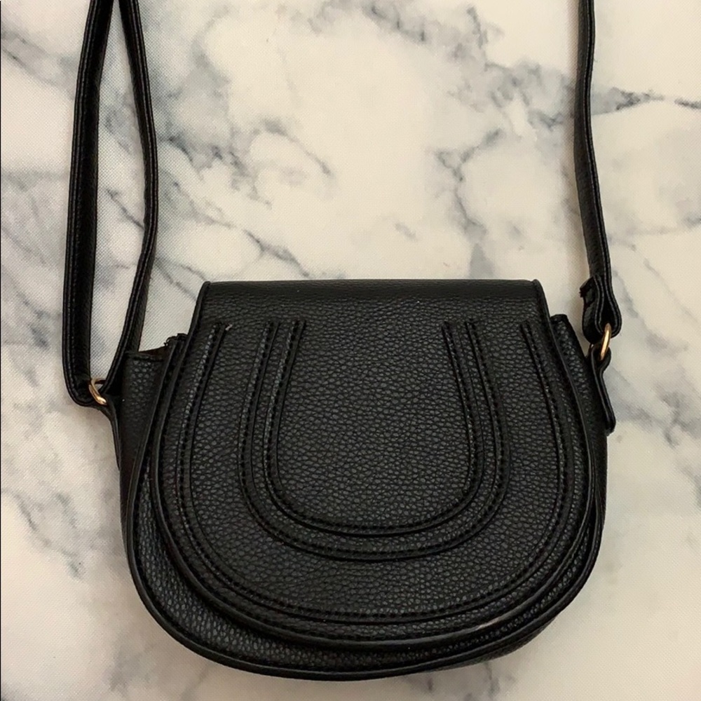 A cute black fox leather crossbody!
